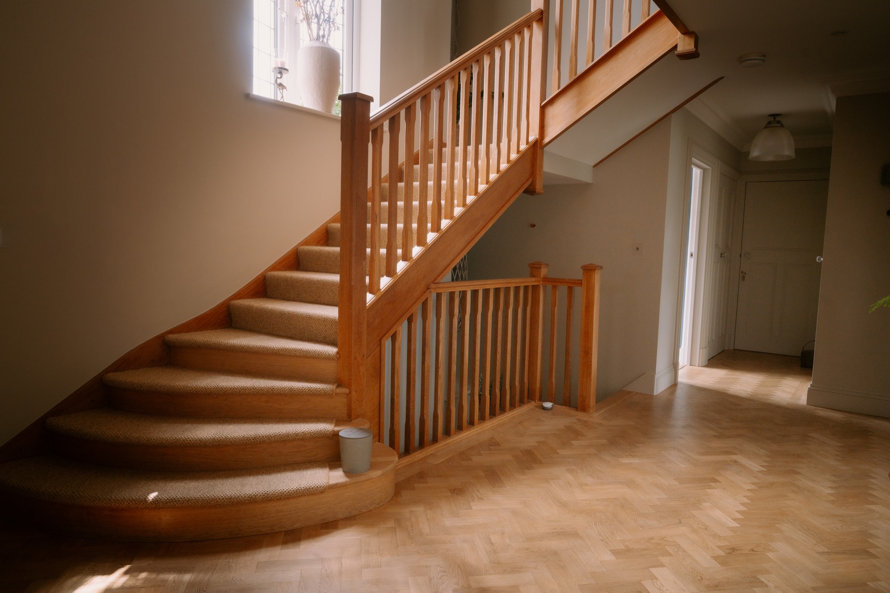 Wide view of the hall and timber staircase