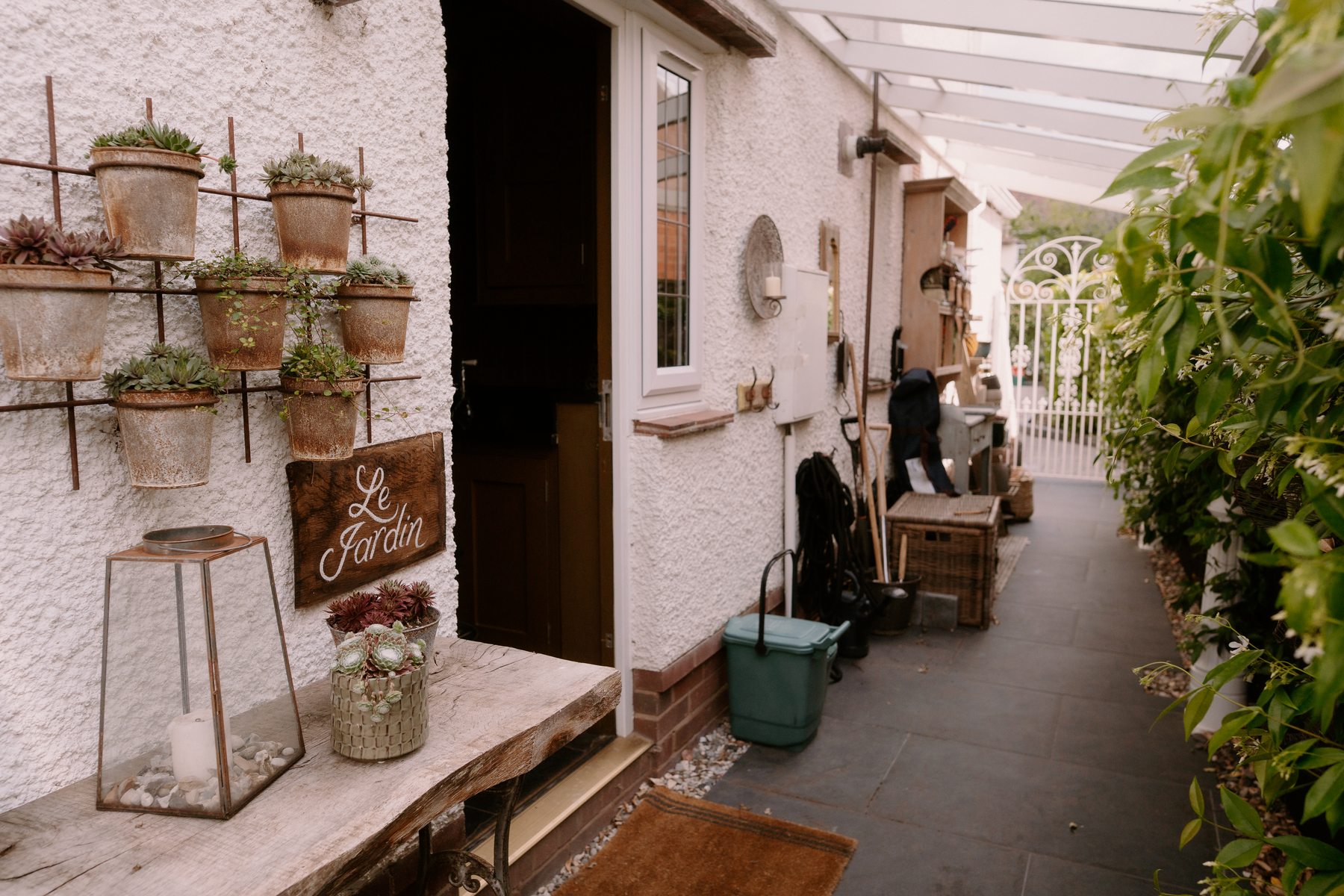Garden side passage with potted plants