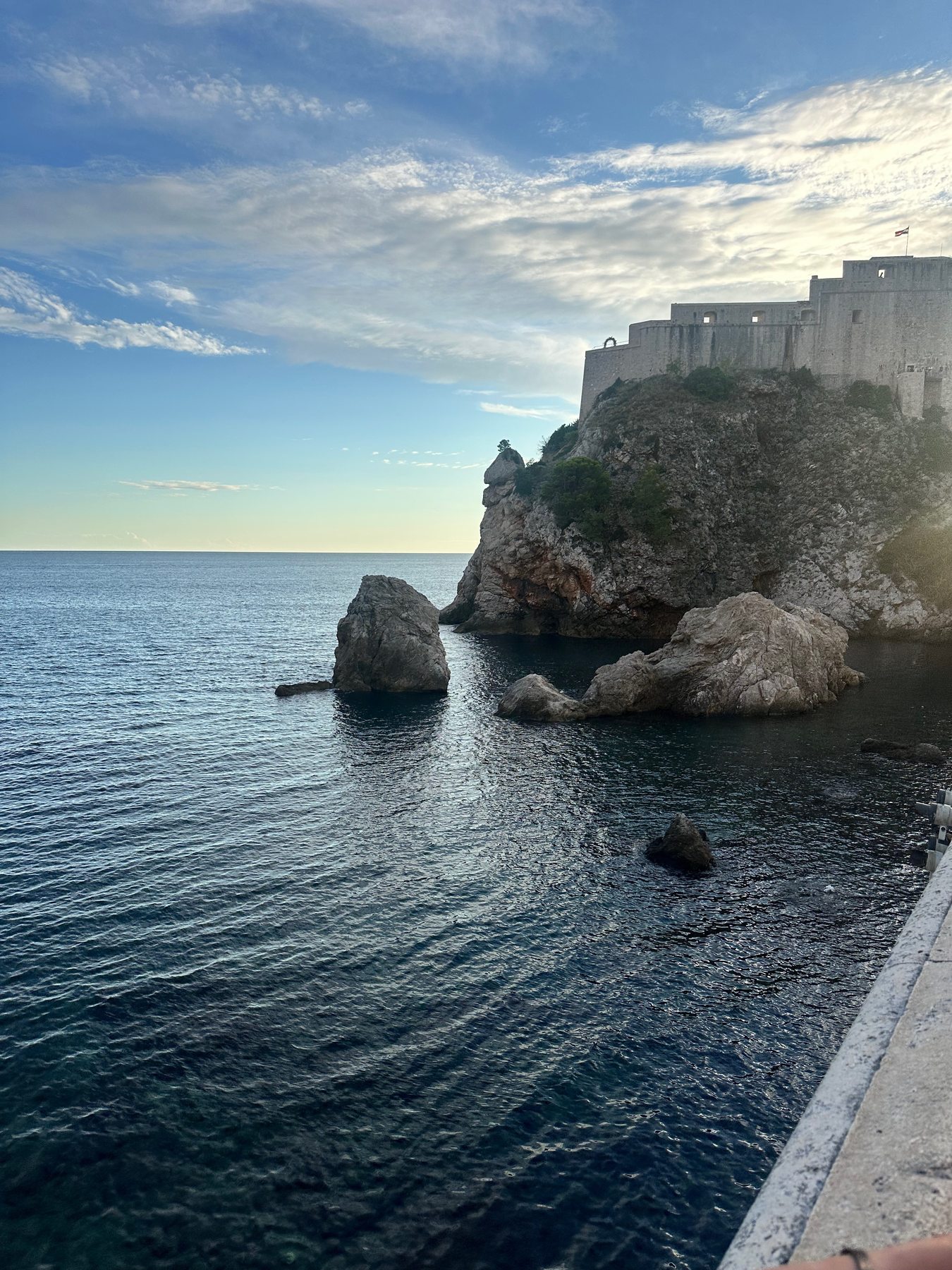 Rocky coastline and clear sea in Dubrovnik